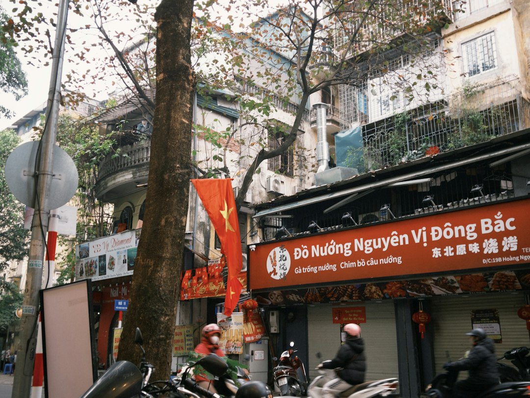 Street scene with buildings and motorbikes in vietnam