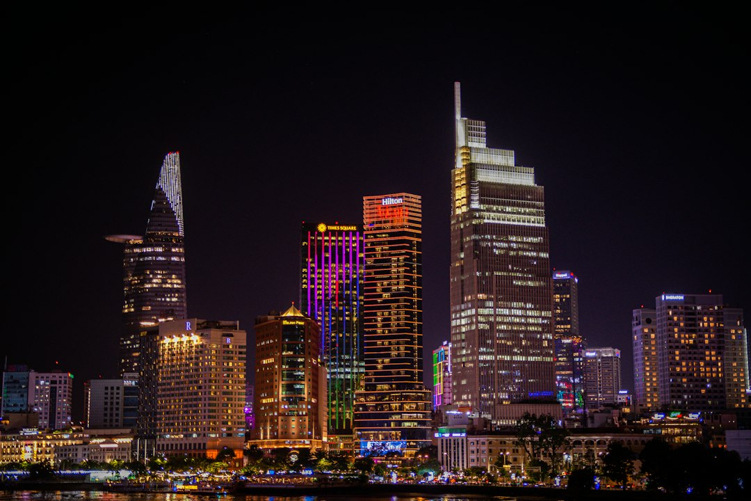 Vibrant cityscape with illuminated skyscrapers at night